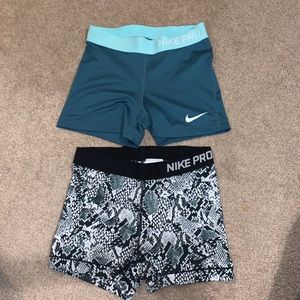 PAIR OF 2 NIKE PRO SHORTS